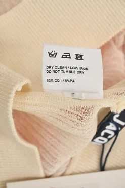 Dip-dyed peach semi-sheer cotton-blend plissé knit pull-on knee-length skirt with lettuce edges