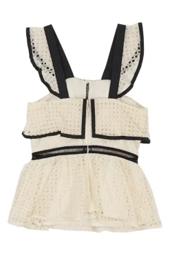 Ecru and black eyelet cotton ruffled peplum bustier top with contrast piping details