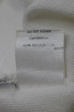 Ecru cotton jersey short sleeve button-front top with Coco Mark shank buttons