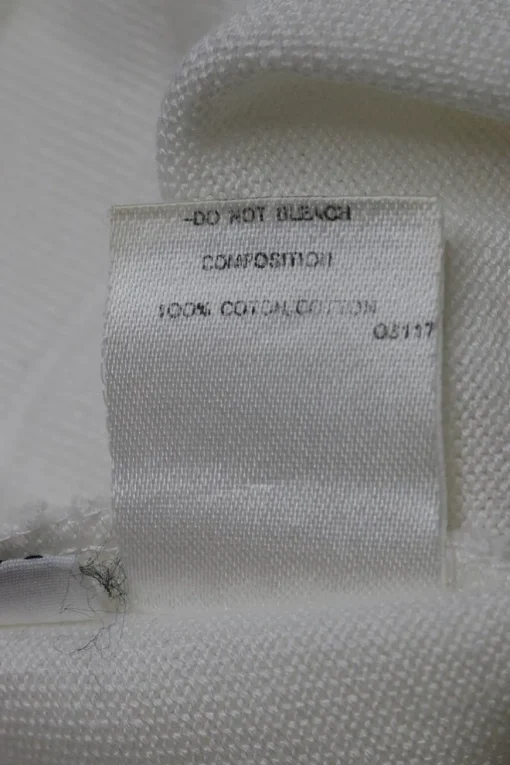 Ecru cotton jersey short sleeve button-front top with Coco Mark shank buttons