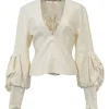 Ecru cotton plunge neck bishop sleeve blouse with frame-defining princess seams