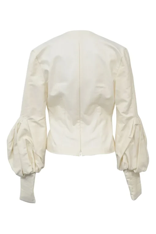 Ecru cotton plunge neck bishop sleeve blouse with frame-defining princess seams