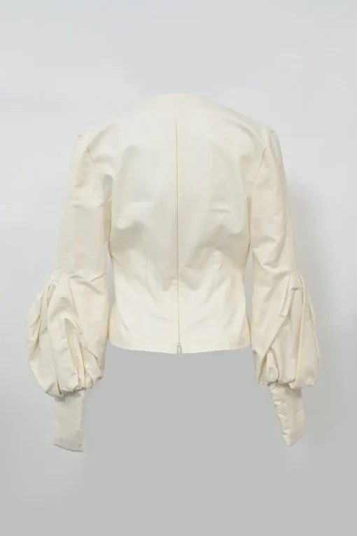 Ecru cotton plunge neck bishop sleeve blouse with frame-defining princess seams