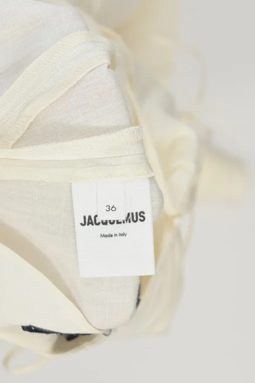 Ecru linen La Robe Camargue open-back godet slip bridal gown with stacked tie fastening at centre back