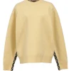 Ecru wool-blend crewneck pullover sweater with zip cuffs and monogram flower binding detail