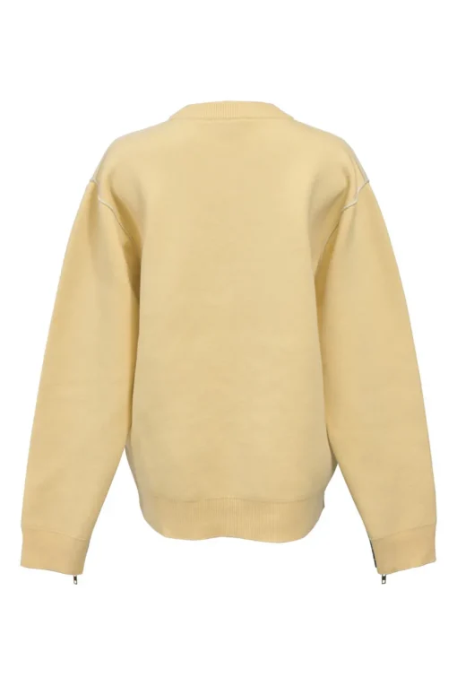 Ecru wool-blend crewneck pullover sweater with zip cuffs and monogram flower binding detail