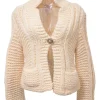 Ecru wool-blend purl knit stand collar cardigan with single lion shank button closure