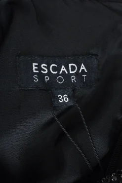 Escada Sport black sleeveless knee length dress with side pockets, gun metal embellished collar and front decor