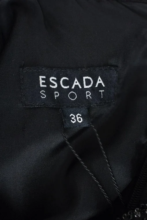 Escada Sport black sleeveless knee length dress with side pockets, gun metal embellished collar and front decor