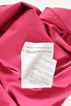 Fuchsia cotton poplin sleeveless blouse with ruffled high collar and darted bodice