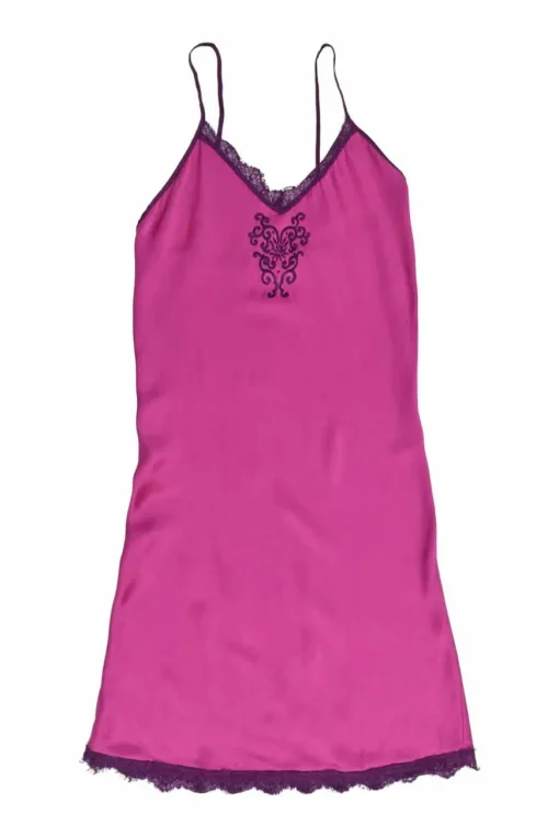 Fuchsia lace-trimmed silk slip dress featuring floral broderie motif at centre front