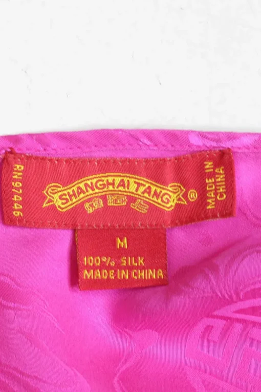 Fuchsia silk jacquard pullover wrap-effect slip with frog button appliqué and adjustable spaghetti straps