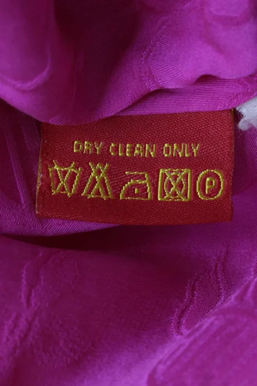 Fuchsia silk jacquard pullover wrap-effect slip with frog button appliqué and adjustable spaghetti straps
