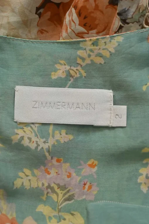 Green and orange cotton-silk blend paneled floral lace swing-style blouse with contrasting cutout edge trim appliqué
