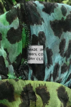 Green bias-cut draped cotton leopard print ruffle collar half-button tie-waist blouson mini dress with dolman sleeves
