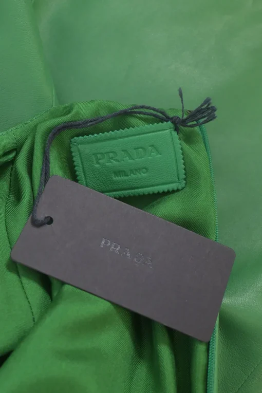 Green lambskin leather short sleeve top featuring logo-emblazoned chest patch pocket