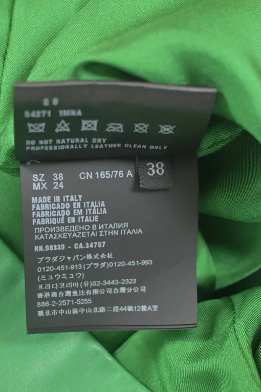 Green lambskin leather short sleeve top featuring logo-emblazoned chest patch pocket