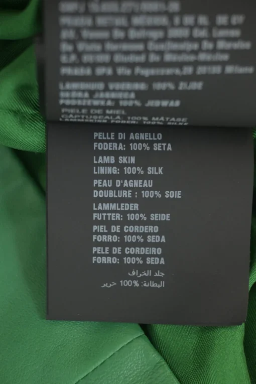 Green lambskin leather short sleeve top featuring logo-emblazoned chest patch pocket