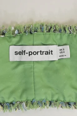 Green polyester-blend bouclé tweed check button-front cropped bustier top