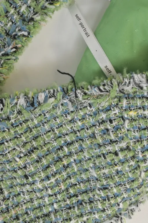 Green polyester-blend bouclé tweed check button-front cropped bustier top
