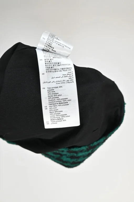 Green polyester-wool-blend houndstooth tweed mini skirt with contrast piping details