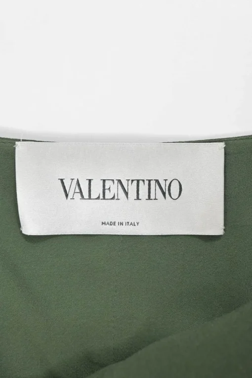 Green silk cady portrait neck sleeveless cape gown