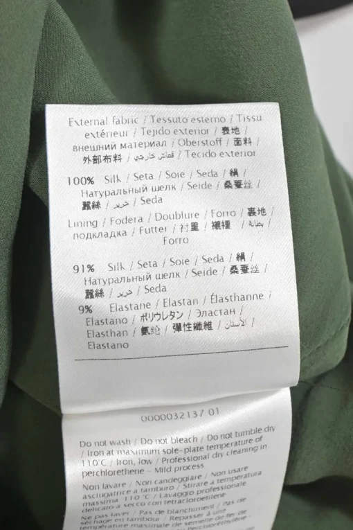 Green silk cady portrait neck sleeveless cape gown