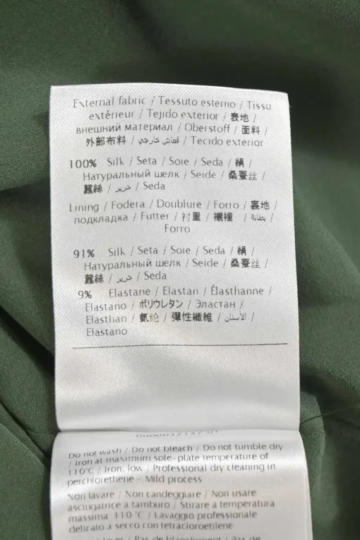 Green silk cady portrait neck sleeveless cape gown