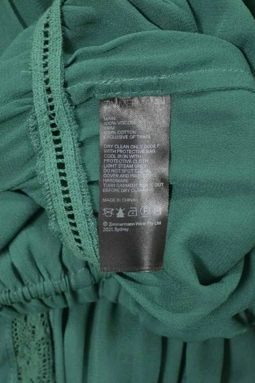 Green viscose peek-a-boo long sleeve midi dress with drawstring neckline and waist