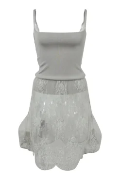 Grey polyamide-blend jersey knit peek-a-boo slip-style mini dress with tonal sheer lace skirt