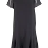 Grey short sleeve knee length shift dress with ruffled hem and crystals embellishment on the front neckline