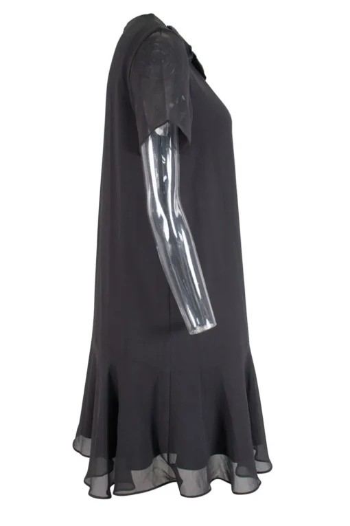 Grey short sleeve knee length shift dress with ruffled hem and crystals embellishment on the front neckline