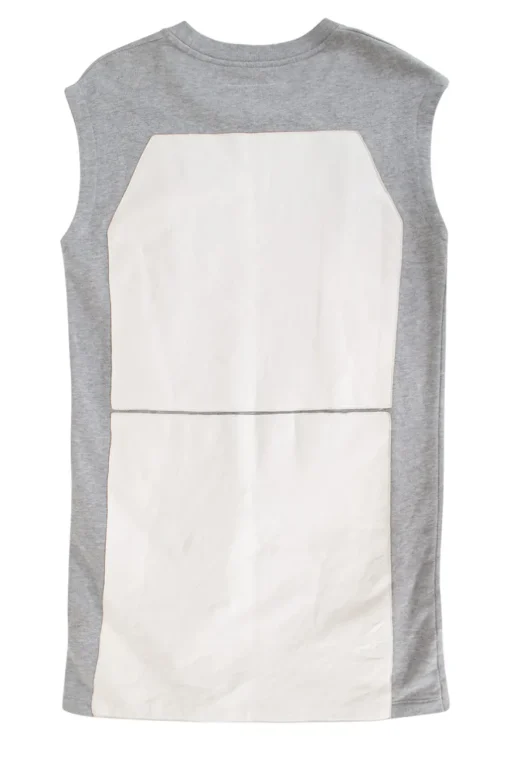 Grey sleeveless top with white leather patches