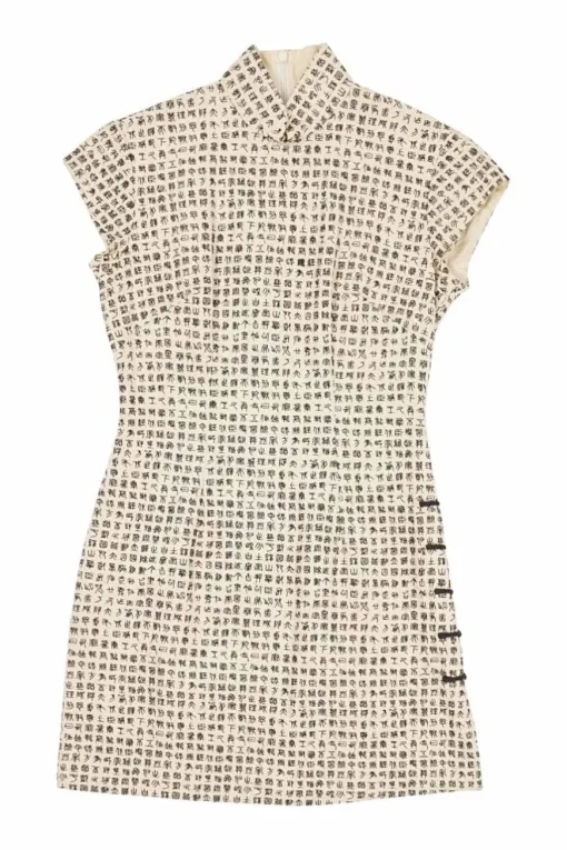 Ivory and black two-tone silk oracle bone script jacquard qipao sheath with frog button hip appliqué