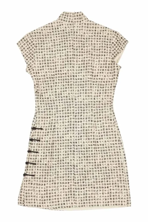 Ivory and black two-tone silk oracle bone script jacquard qipao sheath with frog button hip appliqué