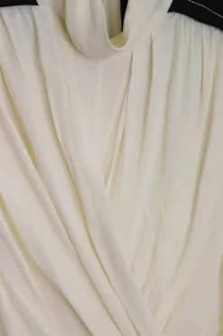 Ivory and black viscose high neck draped tie-waist midi dress with bishop sleeves and handkerchief hem