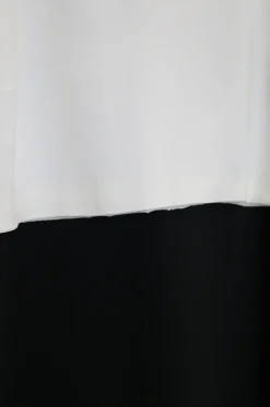Ivory and black viscose-blend paneled mock neck sheath dress with layered capelet insert