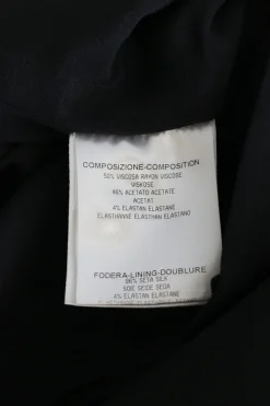 Ivory and black viscose-blend paneled mock neck sheath dress with layered capelet insert