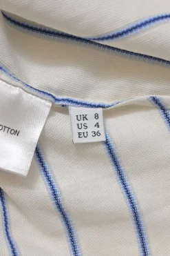 Ivory and blue bias-cut draped striped cotton dolman sleeve blouse