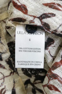 Ivory and burgundy cotton-viscose blend Endah floral print keyhole front tiered flutter sleeve plissé romper
