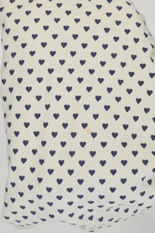 Ivory and navy cotton novelty heart print half-button pullover long sleeve polo top