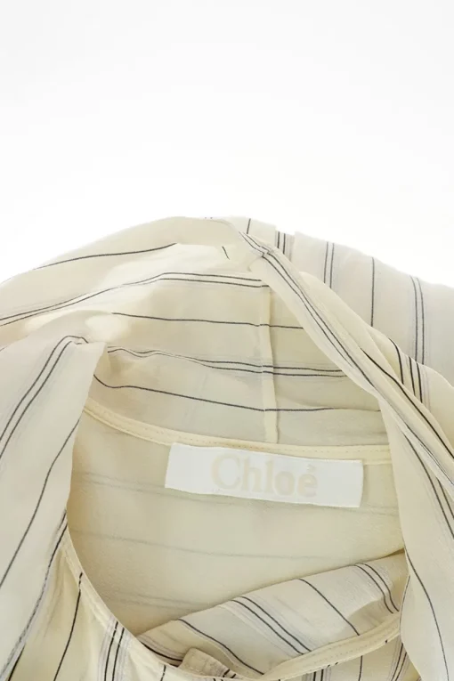 Ivory and navy striped cotton poplin puff sleeve pussy-bow blouse
