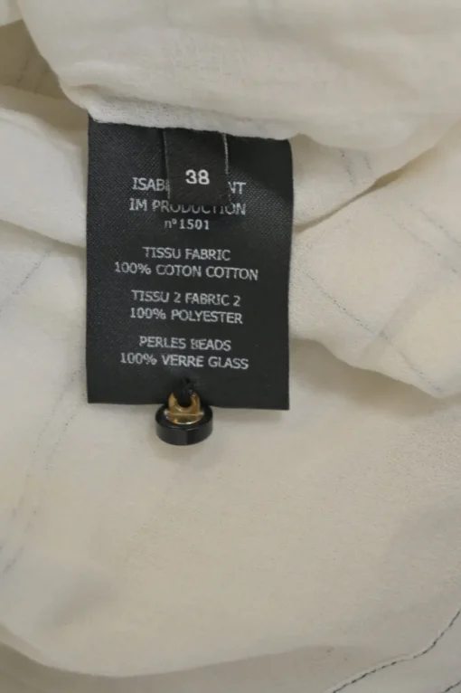 Ivory beaded cotton poplin pintuck peplum swing blouse with half button loop closure at centre front