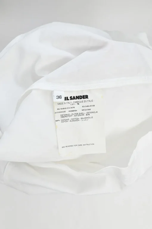 Ivory bias-cut cotton poplin dolman sleeve peplum blouse