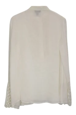 Ivory cotton broderie-paneled silk pullover band-collar half-button bib shirt with flounce cuffs