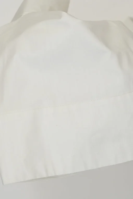 Ivory cotton half-button pullover long sleeve swing-style top with oversized bishop sleeves