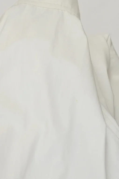 Ivory cotton half-button pullover long sleeve swing-style top with oversized bishop sleeves