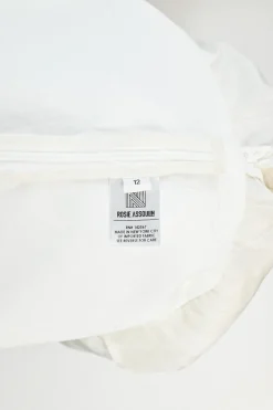 Ivory cotton poplin and floral guipure lace paneled sun dress with fixed straps and handkerchief hem