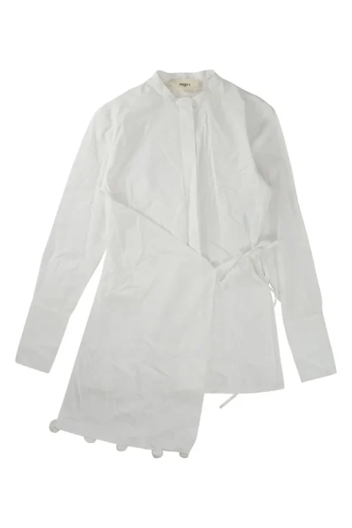 Ivory cotton poplin band collar wrap-front asymmetric apron-style shirt with self-tie fastening at waist