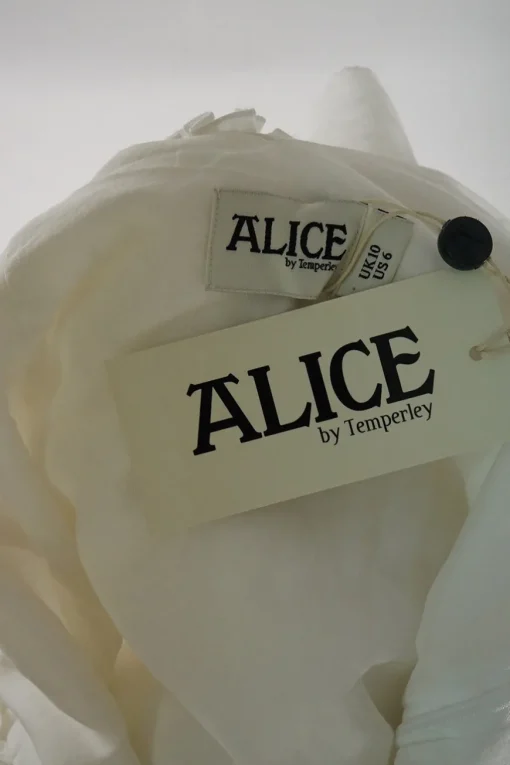 Ivory cotton-blend asymmetric ruffle swing dress with broderie Anlgaise scalloped hem